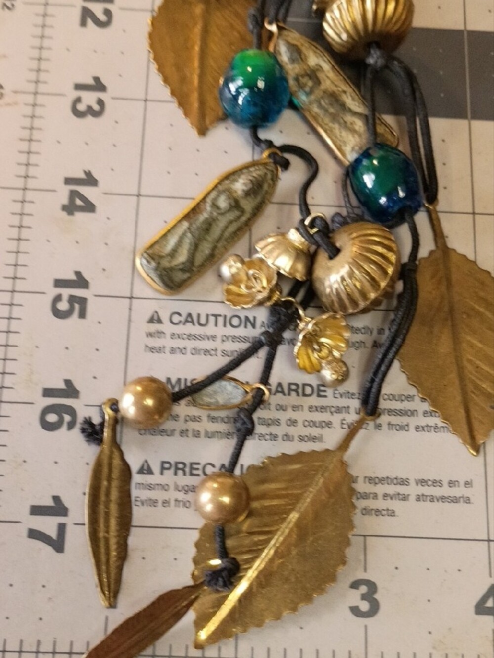 Gold Leaf and Blue-Green Glass Bead Necklace on Black Cord